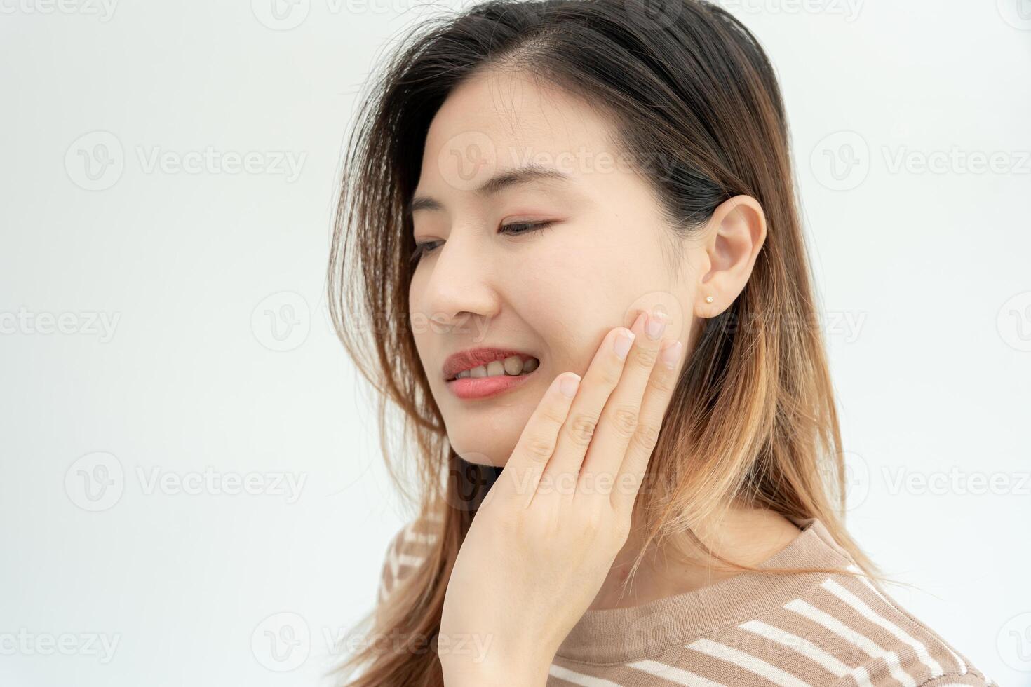 Asian woman feel toothache from gingivitis, female suffer tooth, decay problems, dental care. sensitive tooth, decay problem, bad breath, Gingival Recession, Oral Hygiene instruction, tooth extraction photo