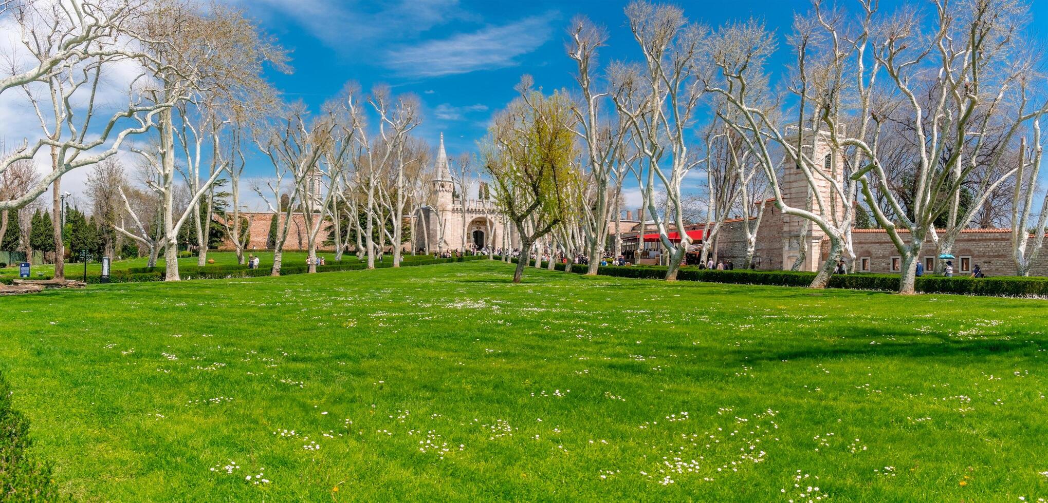 Istanbul, Turkiye, April 14, 2023, View of the main gate, walls and Topkapi Tower in Istanbul. Fragments of the wall and the main gate of Topkapi in Istanbul. photo