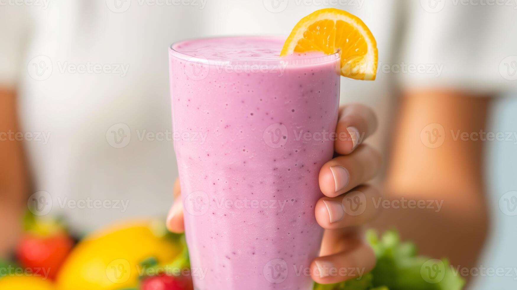 Refreshing Fruit Smoothie In Hand With Lemon Garnish, Healthy Pink Milkshake, Summer Drink, Fresh Fruits Background, Vibrant and Nutritious Beverage, Breakfast Smoothie photo