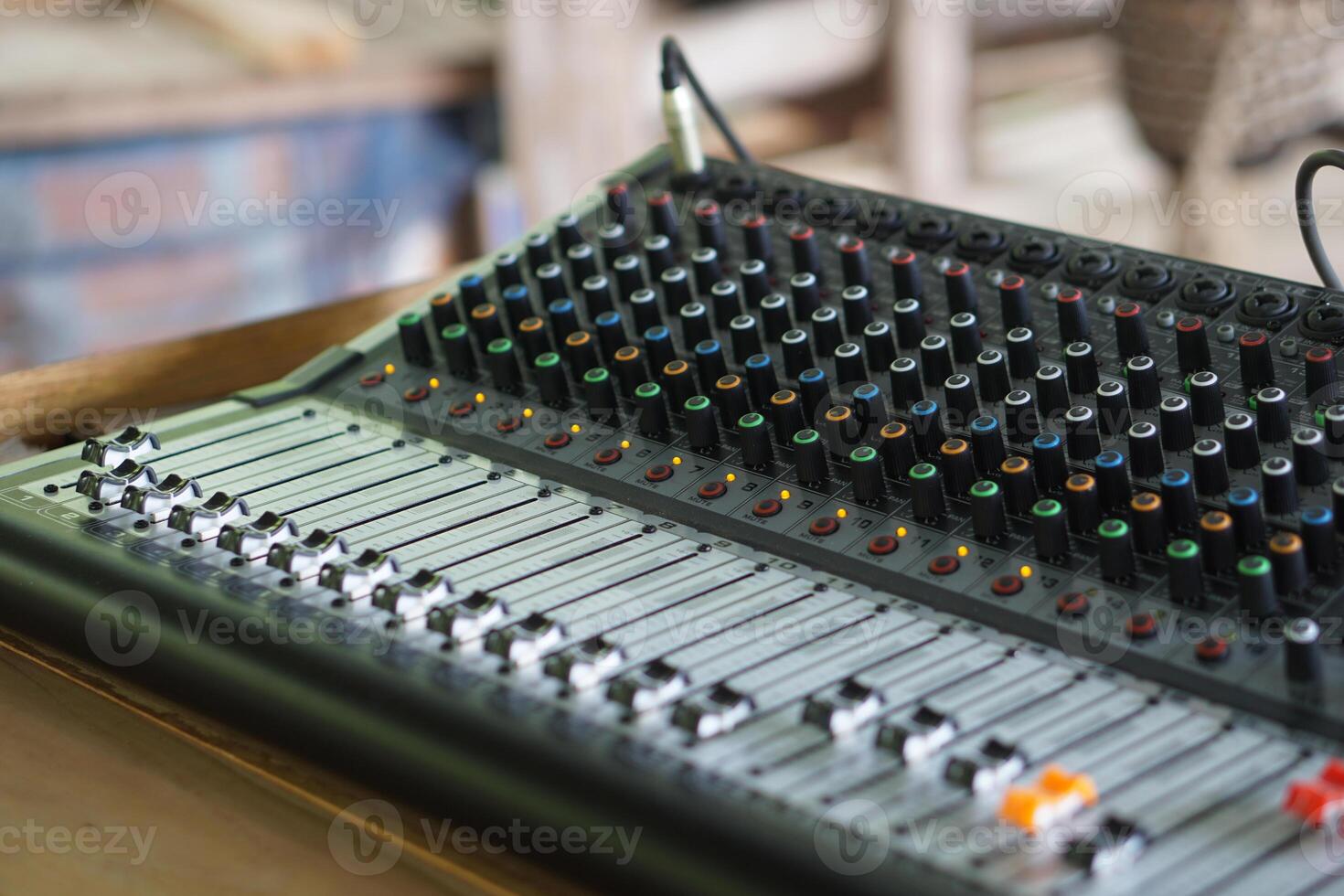 Sound audio mixer machine, amplifier for music with buttons on a mixing equalizer console. Concept, sound controler equipment for Dj or musicians to control level of different sound for entertainment. photo