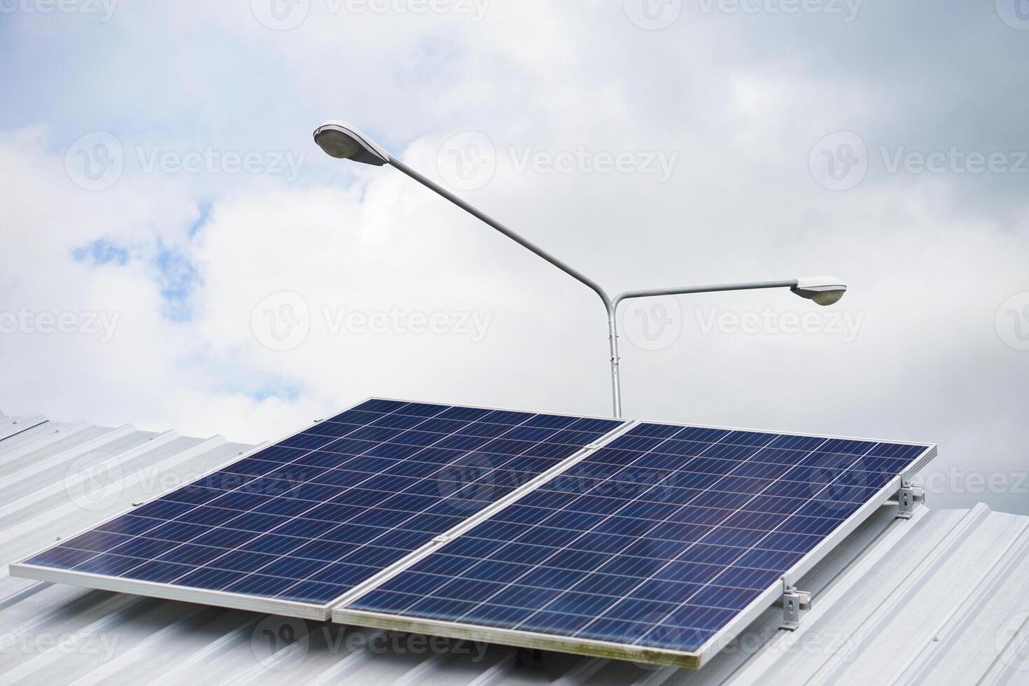 Photovoltaic or solar panels on roof for generating electricity for lamps. Concept using green and clean energy for environment. Renewable energy, Natural power from sunlight to reduce global warming photo