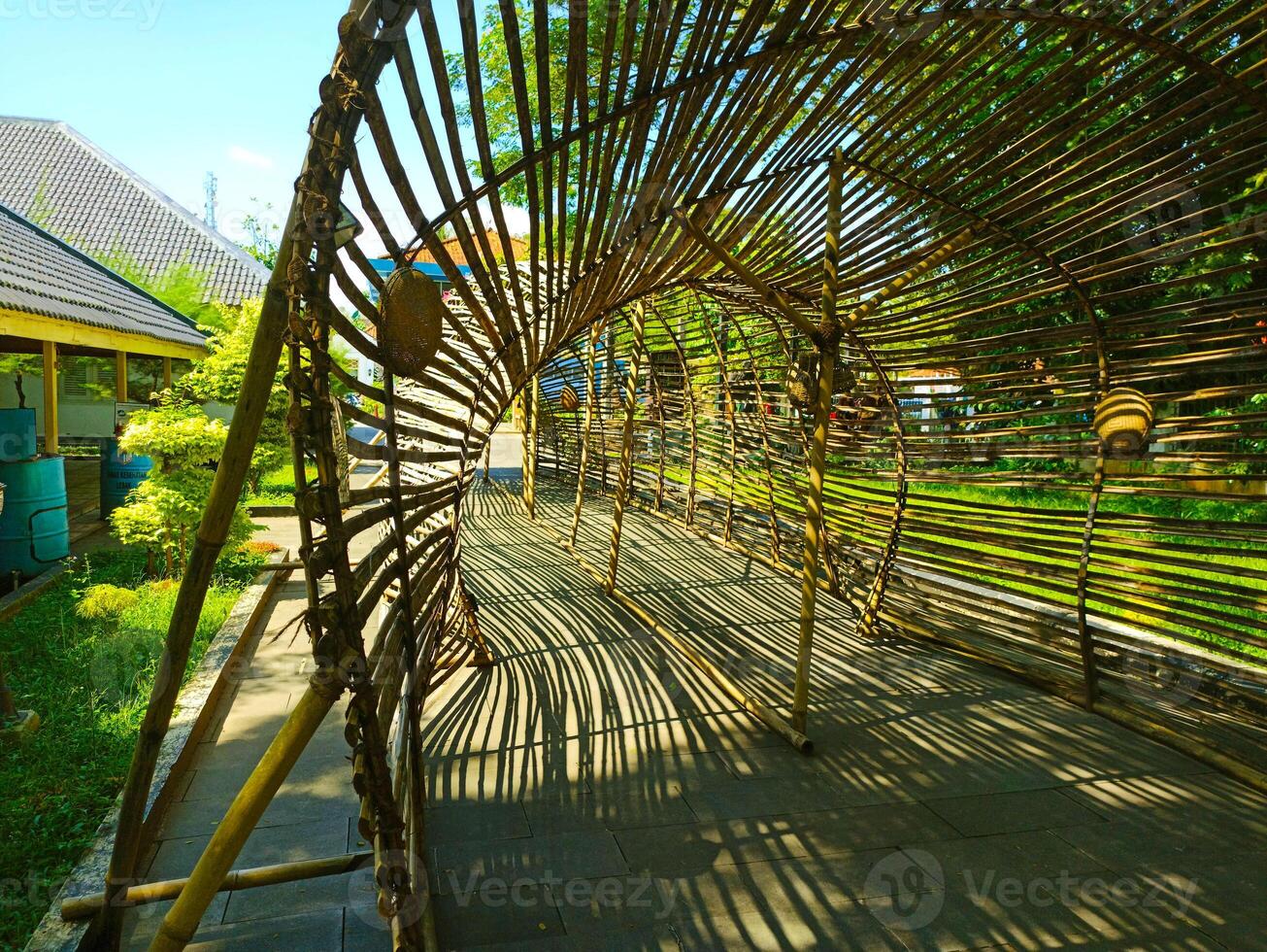 a bamboo structure with a large hole in the middle photo