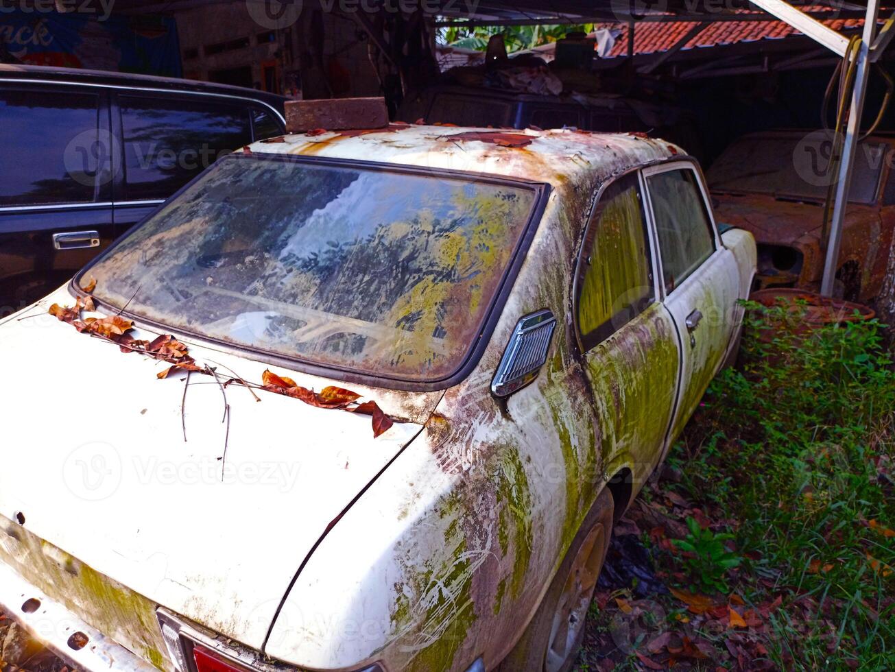 old car wreck in the garage photo