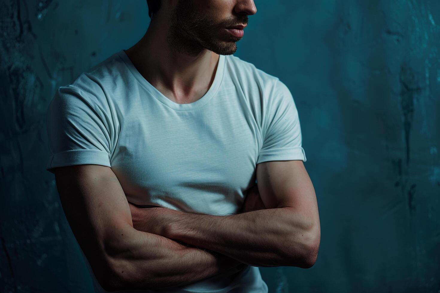 Handsome Fashion Male Model in Tailored T Shirt with Soft Blue Stylish Males portrait Featuring Trendy Soft Blue Background photo