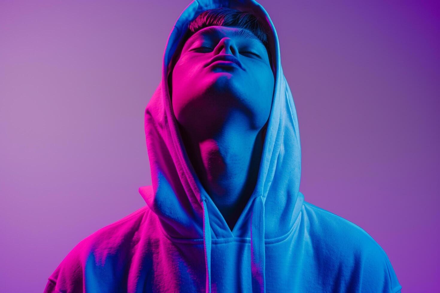 Trendy Fashion Male Model in Silver Hoodie with Neon purple Modern portrait Featuring Vibrant Neon purple Background photo