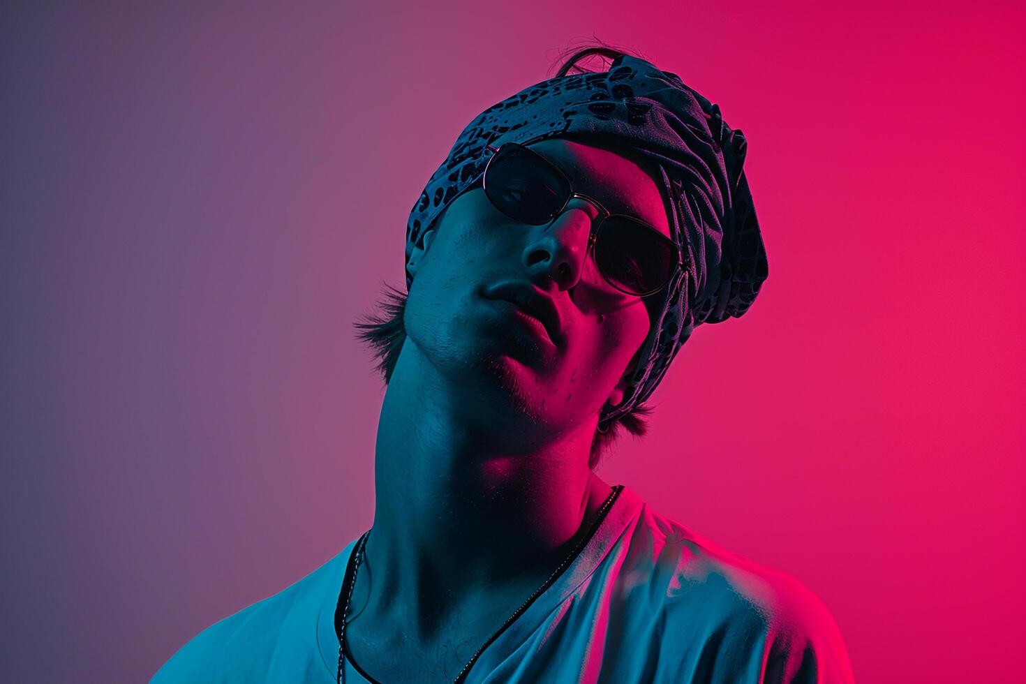 Handsome Male Model in Dark Teal Bandana with Neon pink Stylish portrait Featuring Vibrant Neon pink Background photo