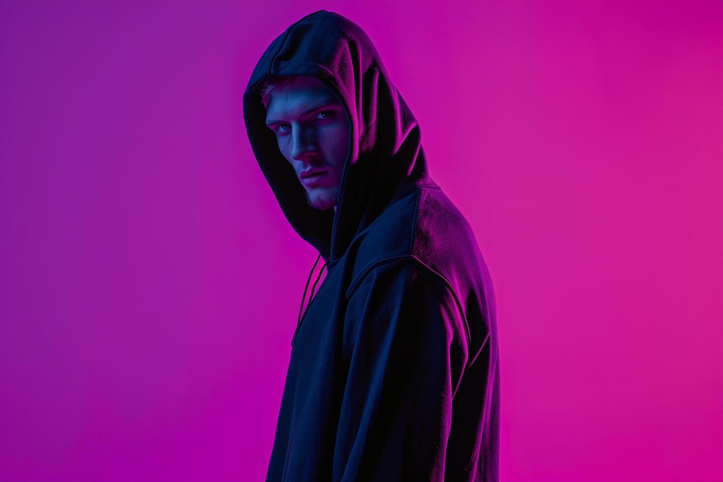 Stylish Fashion Male Model in Matte Black Hoodie with Neon purple Modern Males portrait Featuring Vibrant Neon purple Background photo
