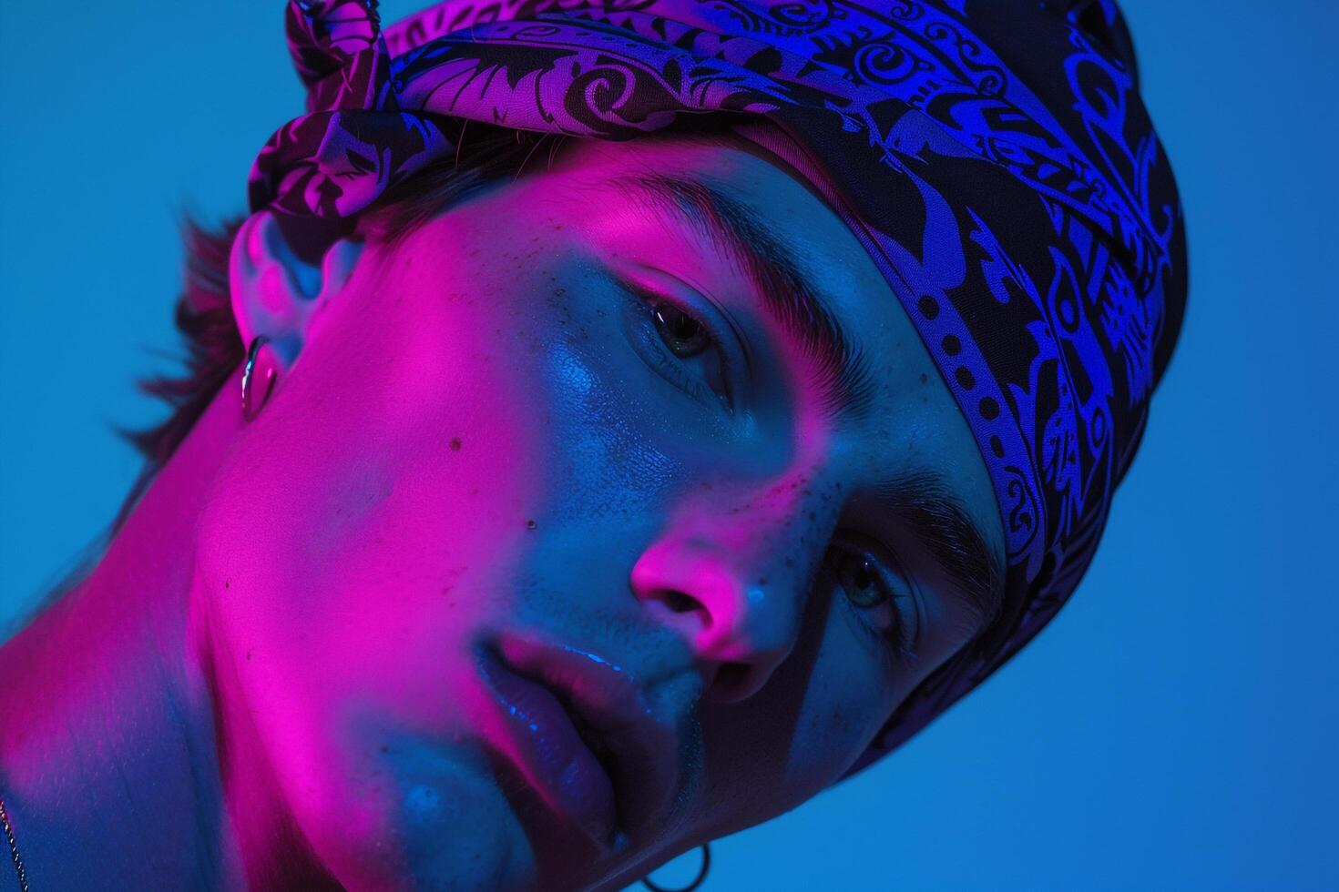 Handsome Fashion Male Model in Dark purple Bandana with Neon Aqua Background Stylish Lifestyle portrait for Modern Males Fashion photo
