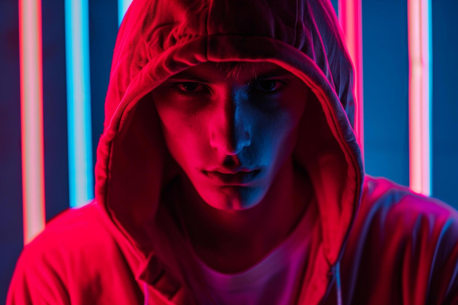 Fashion Male Model in Dark Red Hoodie with Neon Blue Background Stylish Lifestyle portrait for Modern Males Fashion photo