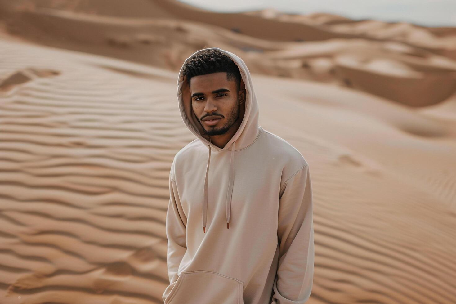 Trendy Hoodie with Soft Sand Handsome Males portrait with Chic Appearance and Modern Fashion Background photo
