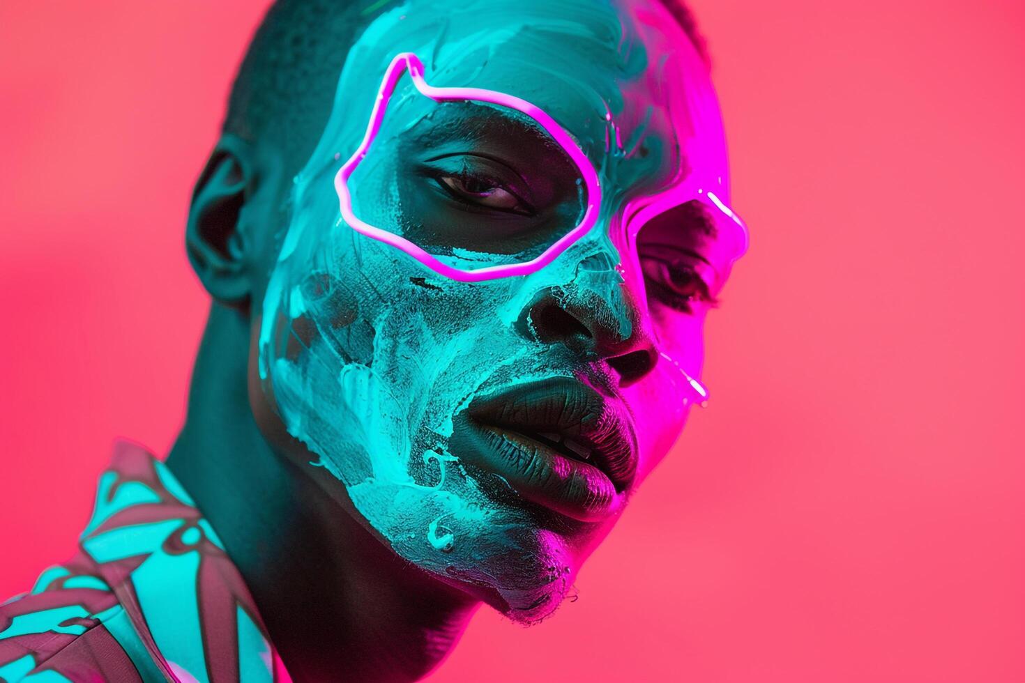Handsome Fashion Male Model in Neon Teal Face Mask with Neon pink Background Trendy Males portrait photo