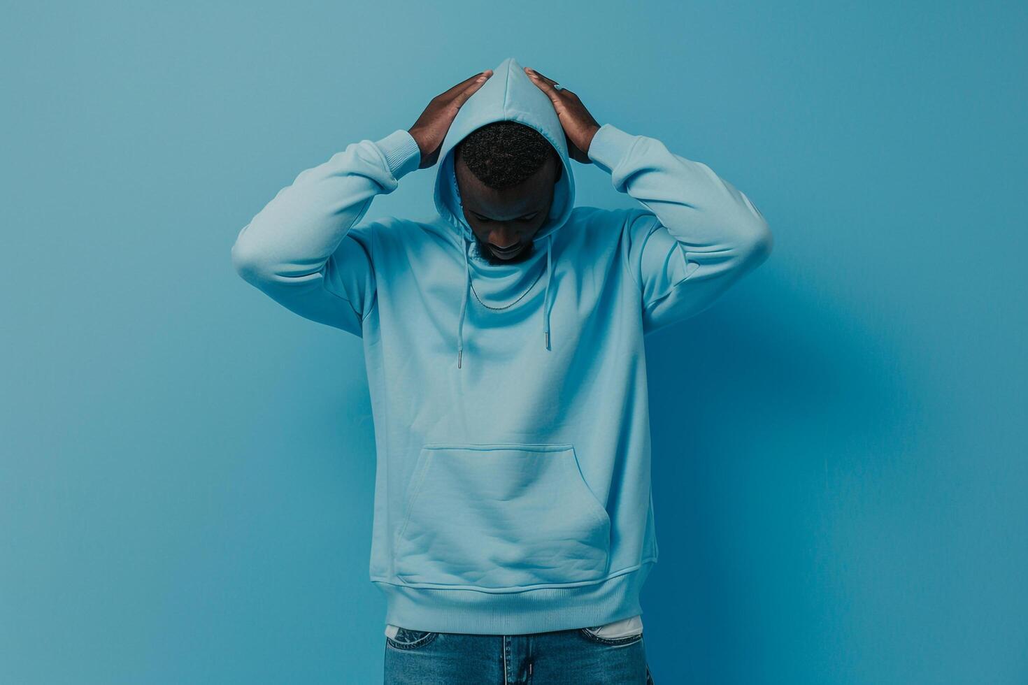 Fashion Model in Relaxed Denim Blue Hoodie Comfortable Lifestyle portrait Trendy Maleswear Style photo