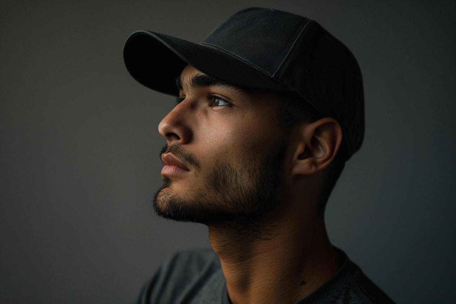 Fashion Model in Basic Tee Grey Background Relaxed portrait Stylish and Comfortable Males Casual Outfit photo