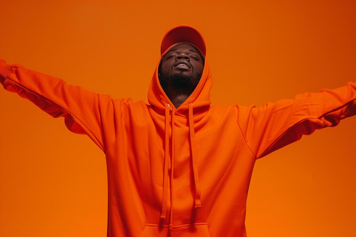 Stylish Fashion Look Hoodie Fashion Model Bright Orange Lifestyle portrait Trendy Male Background photo