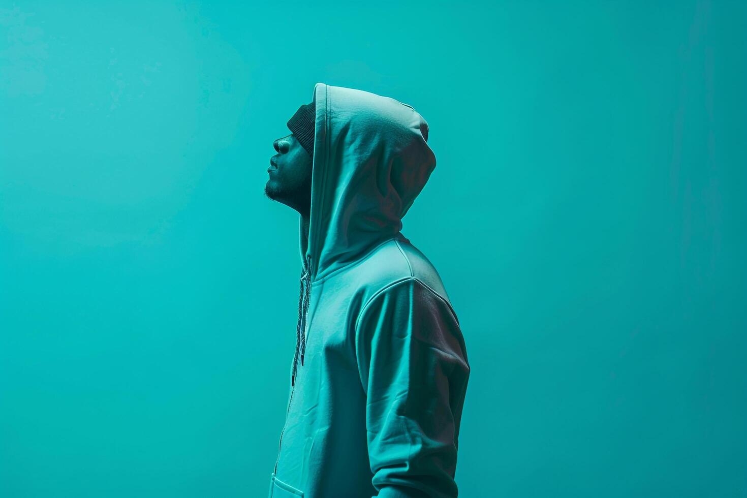 Fashionable Trendy Model in Turquoise Graphic Zip up Hoodie Modern Lifestyle portrait with Dynamic Contemporary Look photo