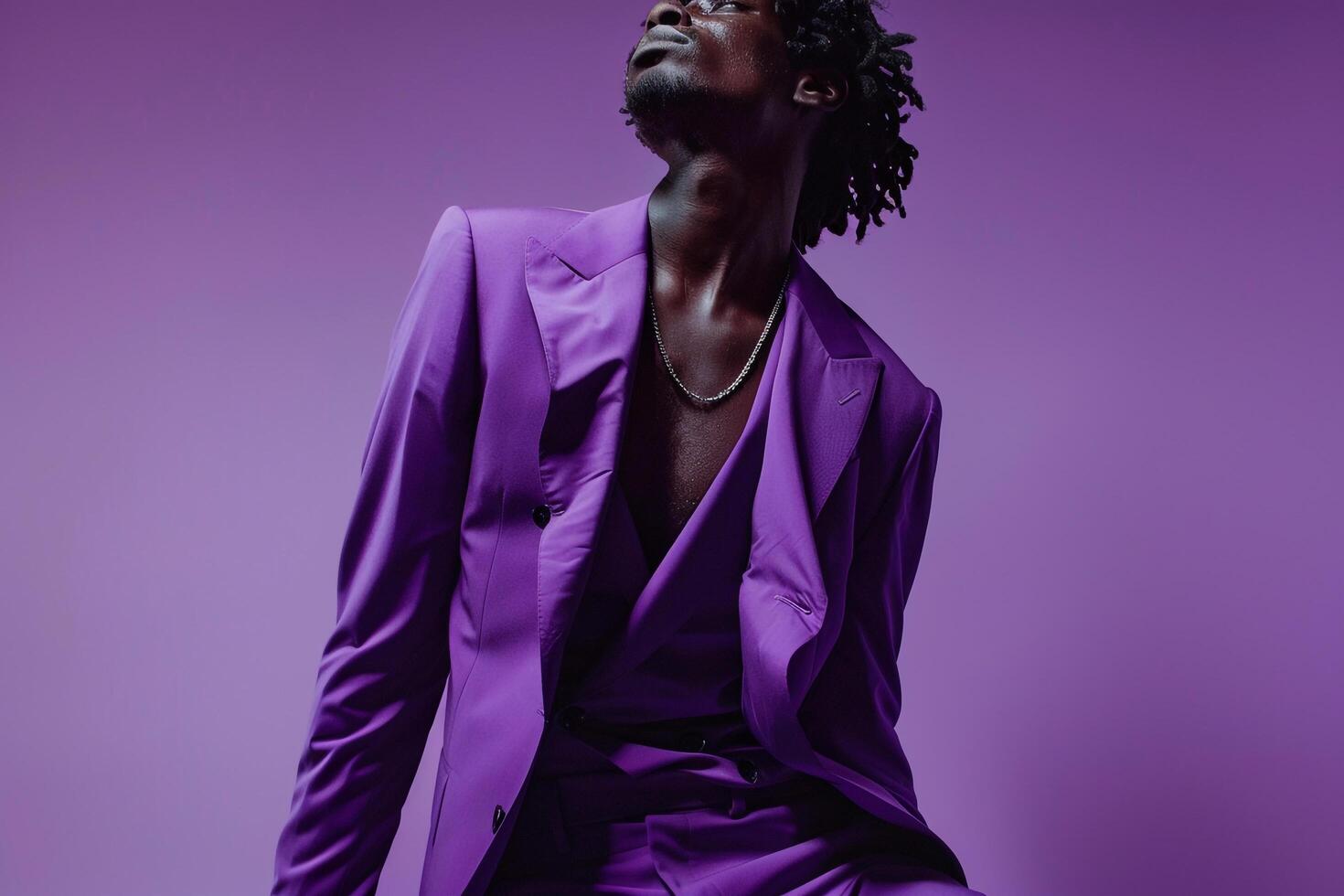 Male model in a lavender suit featured in a classic portrait with a simple background highlighting the latest trends in Males fashion and lifestyle photo