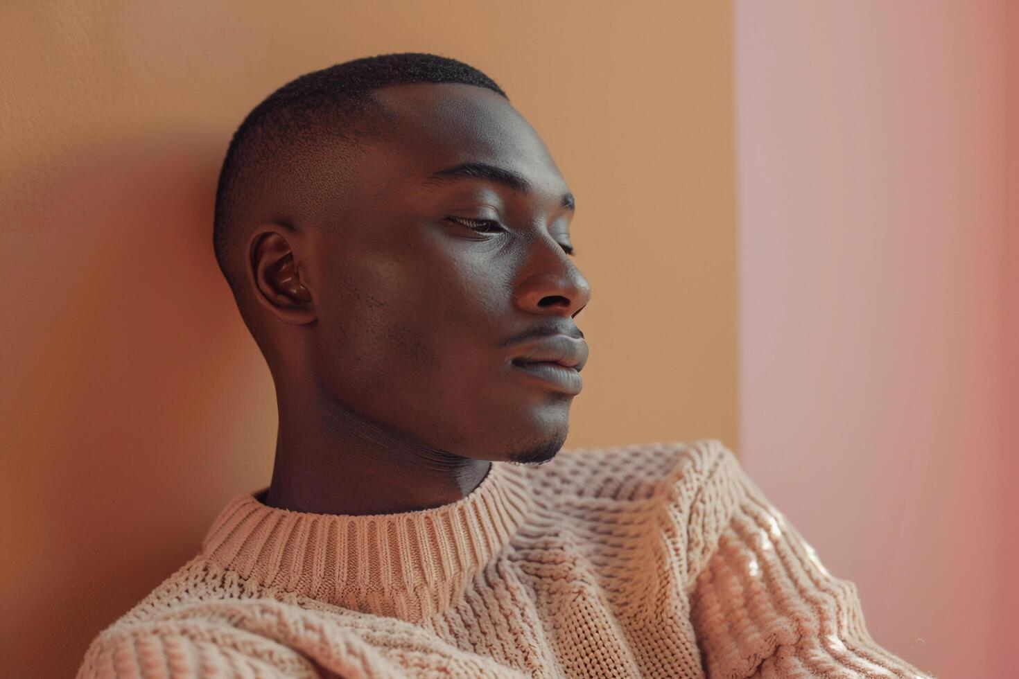 Comfortable Male Fashion Model in Relaxed pullover peach pink Background and Cozy Lifestyle Featuring a Soft Touch in Males Fashion portrait photo
