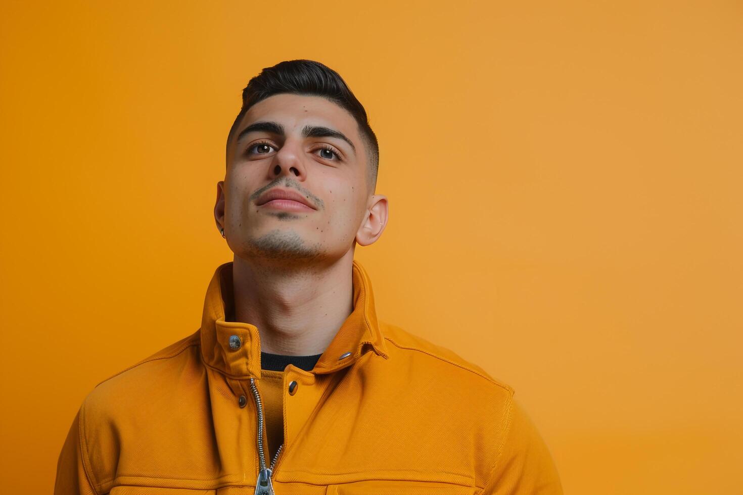 Trendy male fashion model in a zipup jacket withmarigold male background male dress portrait featuringlifestyle Males fashion photo