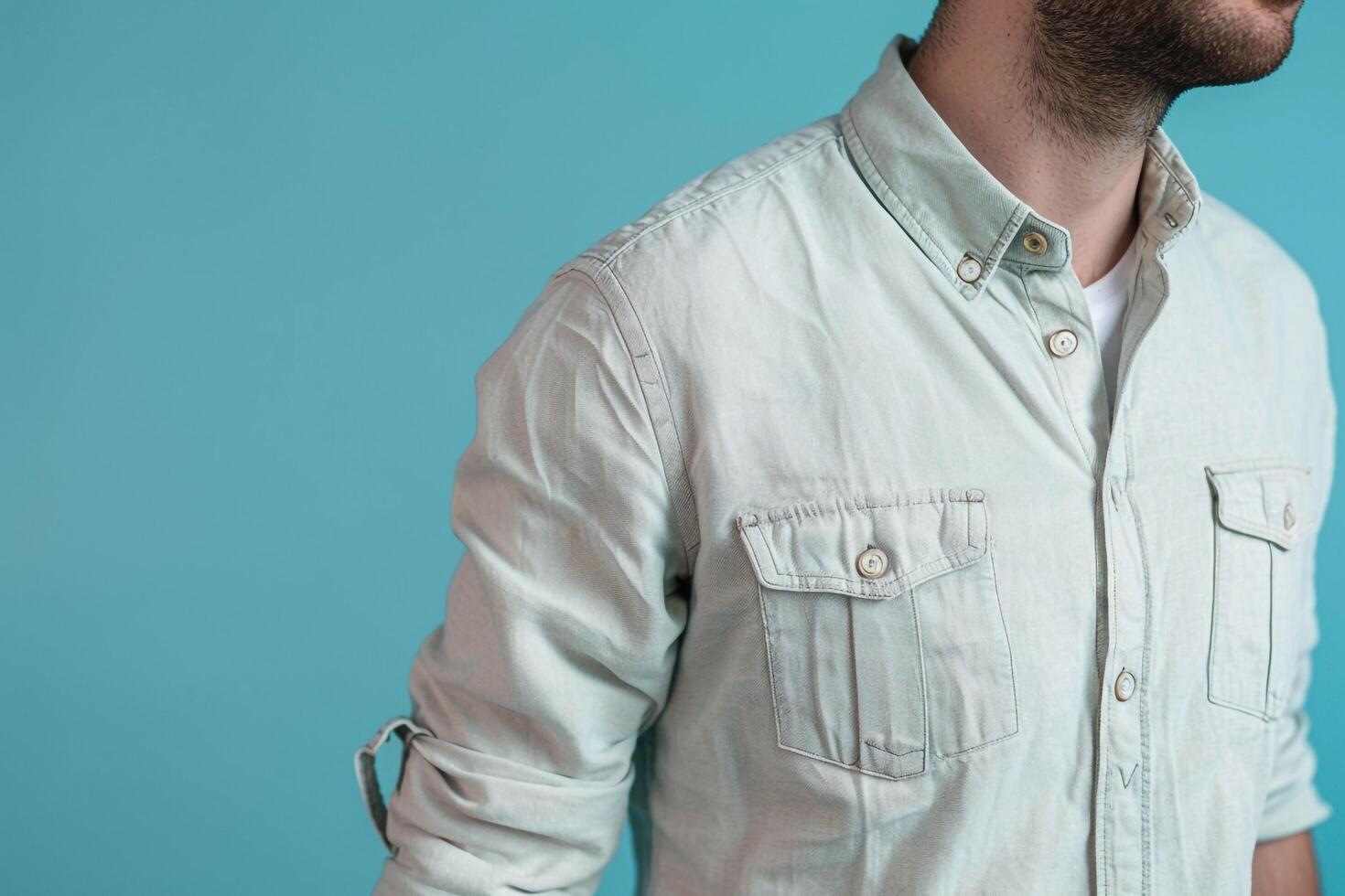 Handsome male model in light blue casual button down fashionable portrait relaxed modern style photo