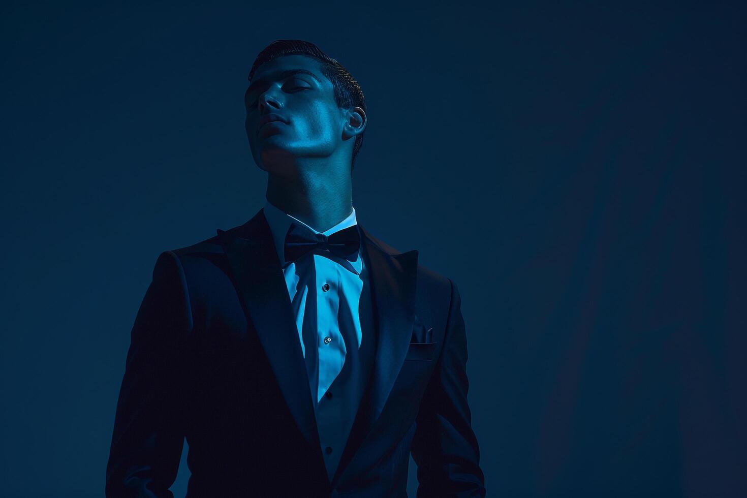 Trendsetting male model in a tailored tuxedo with Maleswear background showcased in a high fashion portrait with luxurious lifestyle eleMalets photo