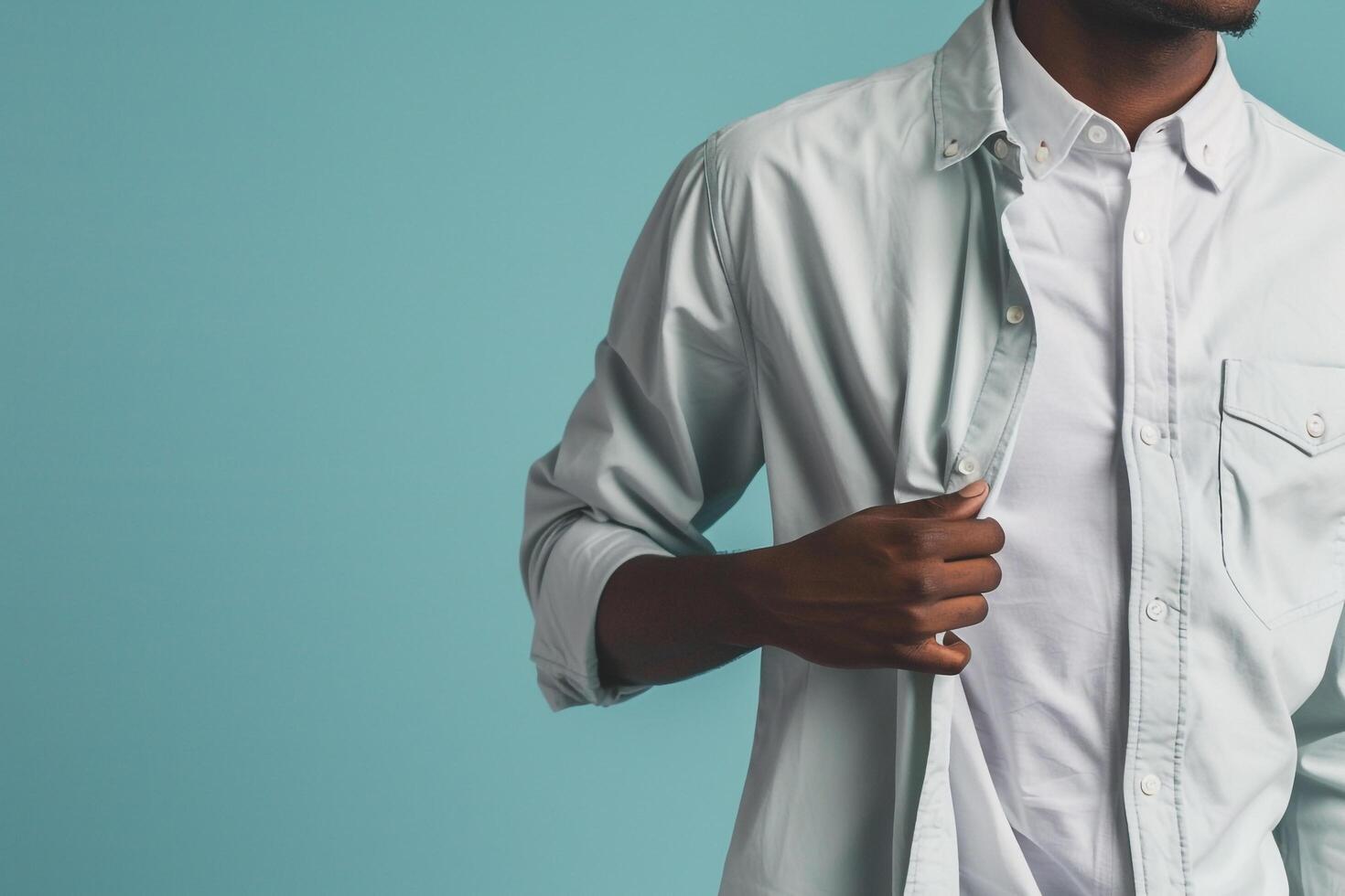 Fashion forward Casual Button Up in Soft Aqua on a male model captured in a relaxed lifestyle portrait focusing on contemporary and laid back Males fashion photo