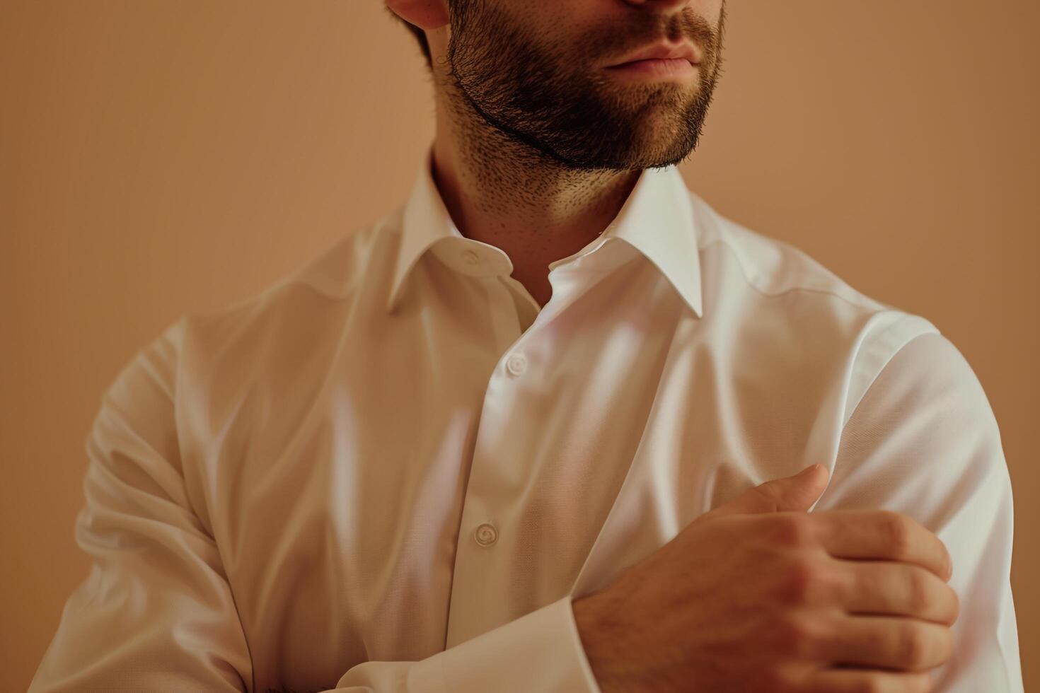 elegant male model in a Dress Shirt with French Cuffs and Light Taupe background showcasing a refined lifestyle portrait of classic Males fashion photo