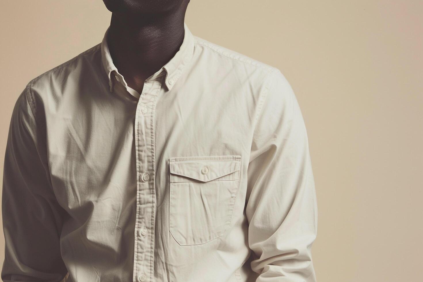 Chic Male in Casual Button Down Shirt with Soft Cream Background for Sophisticated Lifestyle photo