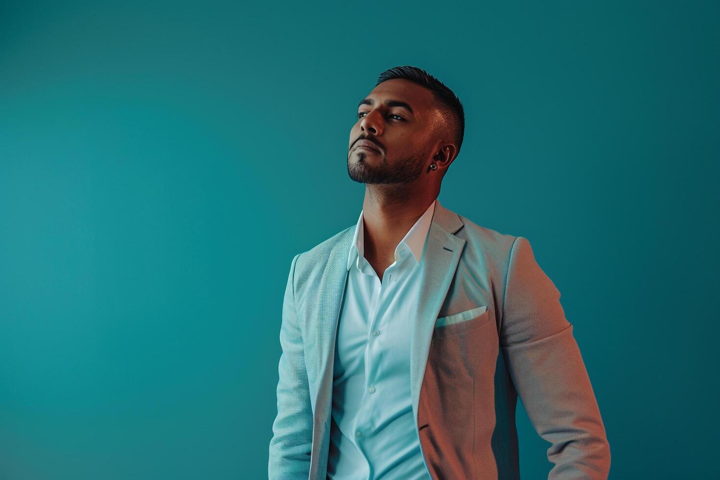 slim fit blazer male dress with ateal blue male background highlightinglifestyle Males and portrait fashion style photo