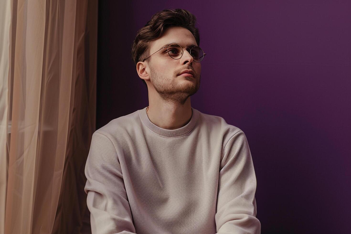 Stylish male fashion model in cozy crewneck showcasing a fashionable lifestyle with a modern and chic portrait photo