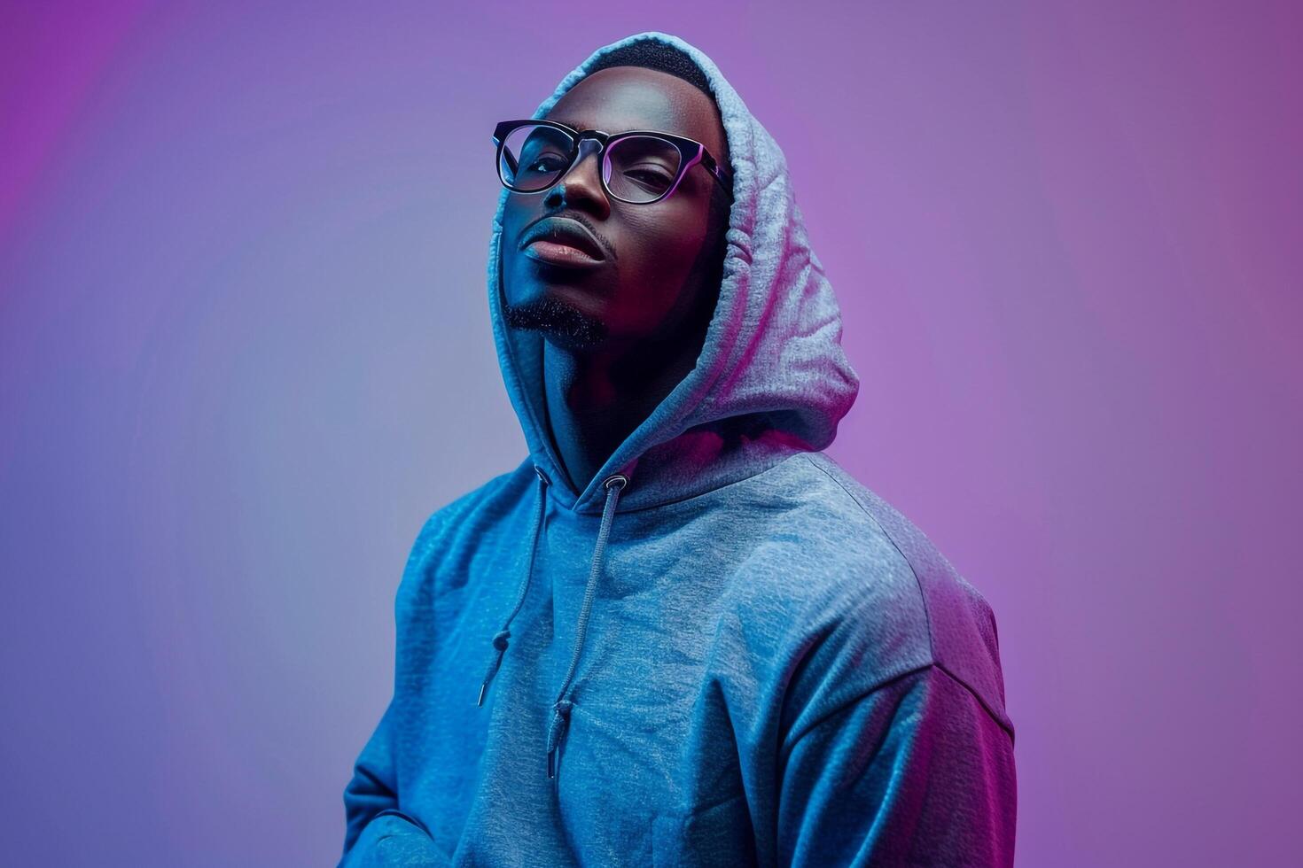 deep gray hoodie and trendy glasses male dress with apurple male background capturing lifestyle Males fashion and portrait style photo