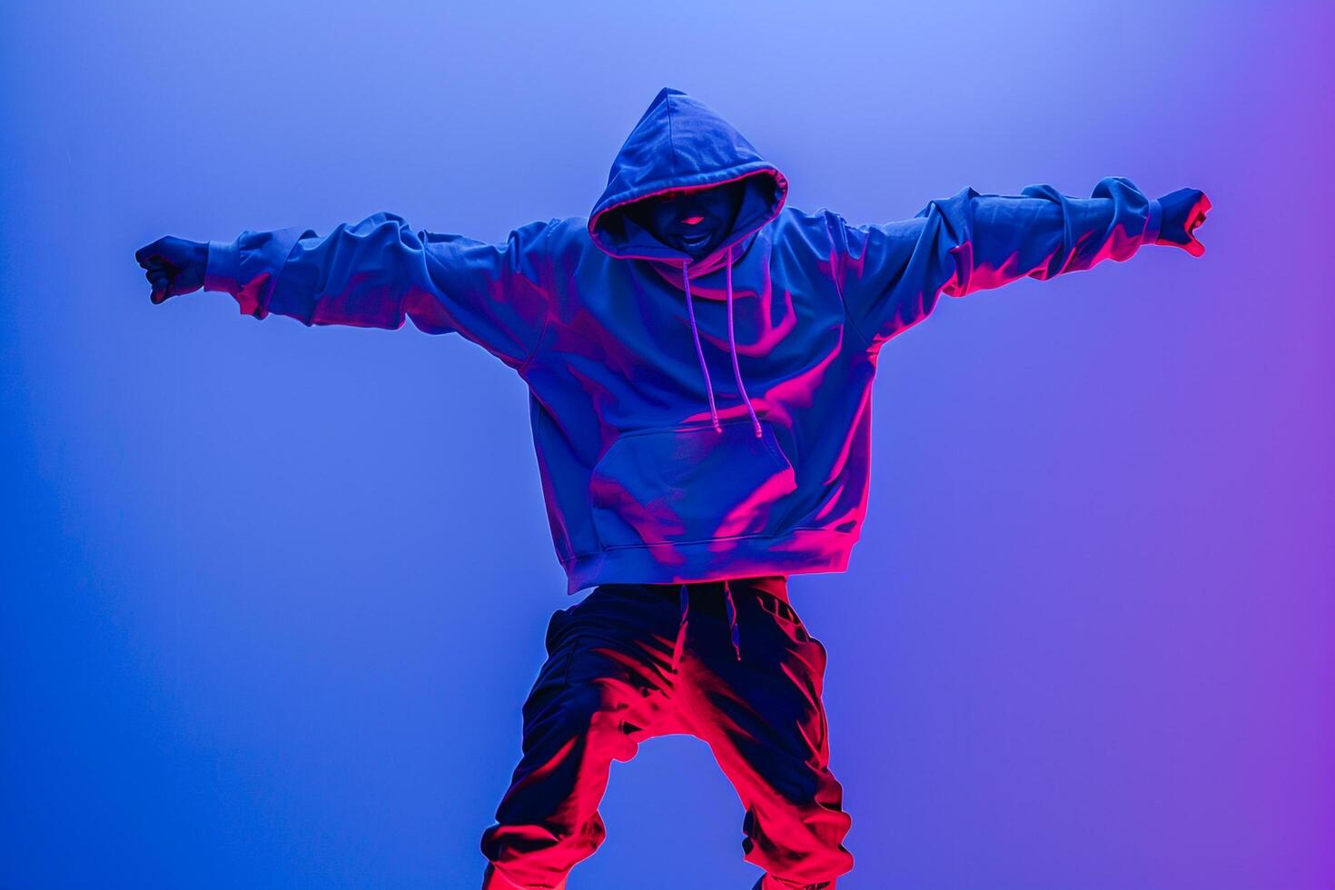 electric Blue Background with Hoodie Clad Male  Lifestyle portrait emphasizing Bold Style and Trendy Fashion photo