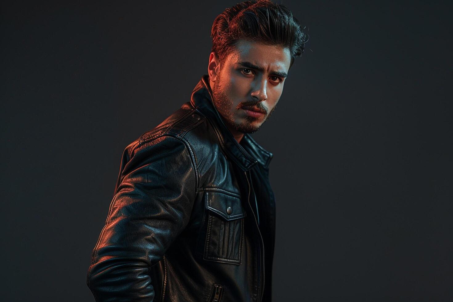 leather Bomber Jacket Clad Male Fashion portrait with Deep Charcoal Background emphasizing Trendy and Classic Style photo
