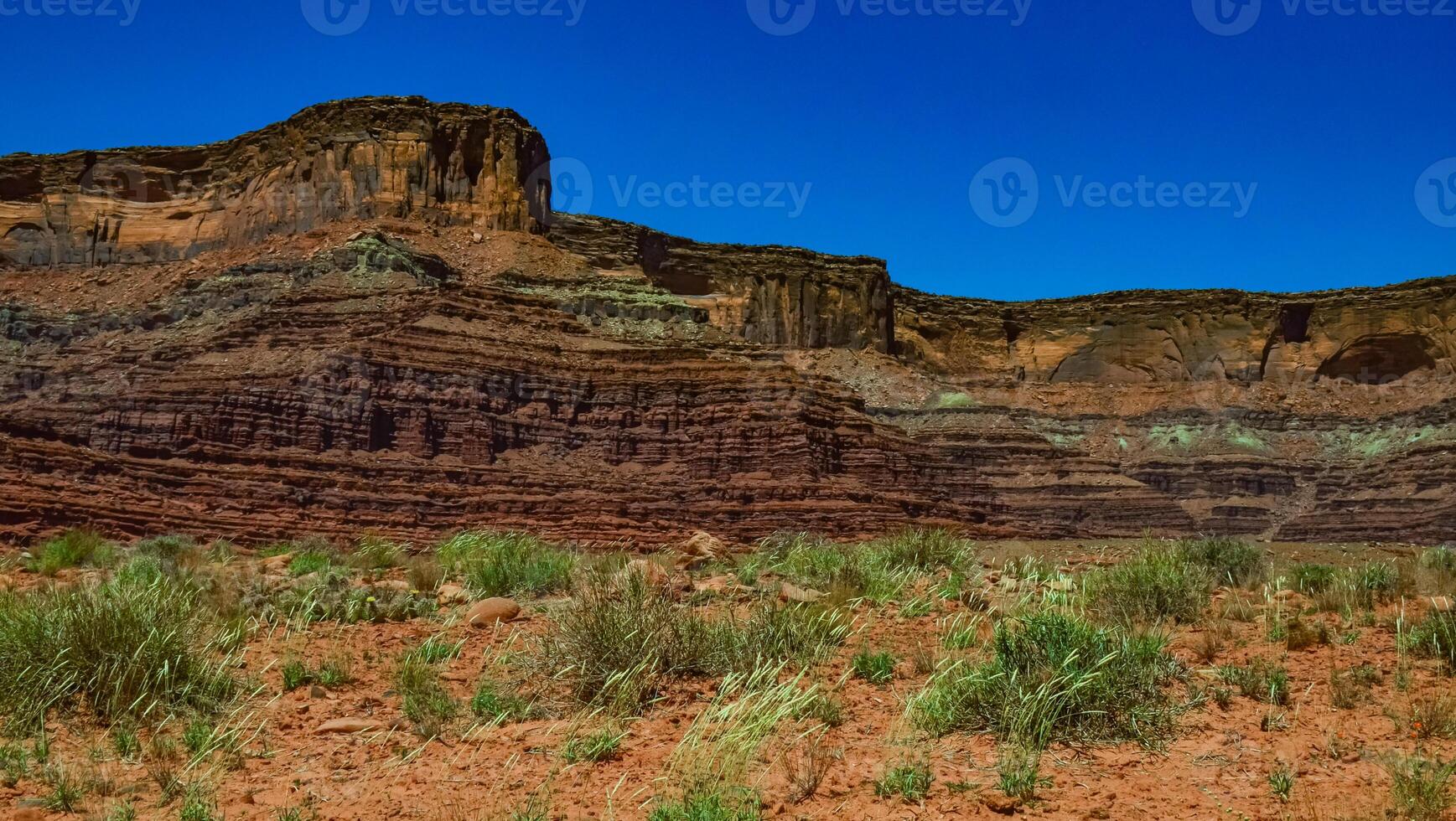 Layered geological formations of red rocks in Canyonlands National Park is in Utah near Moab. photo