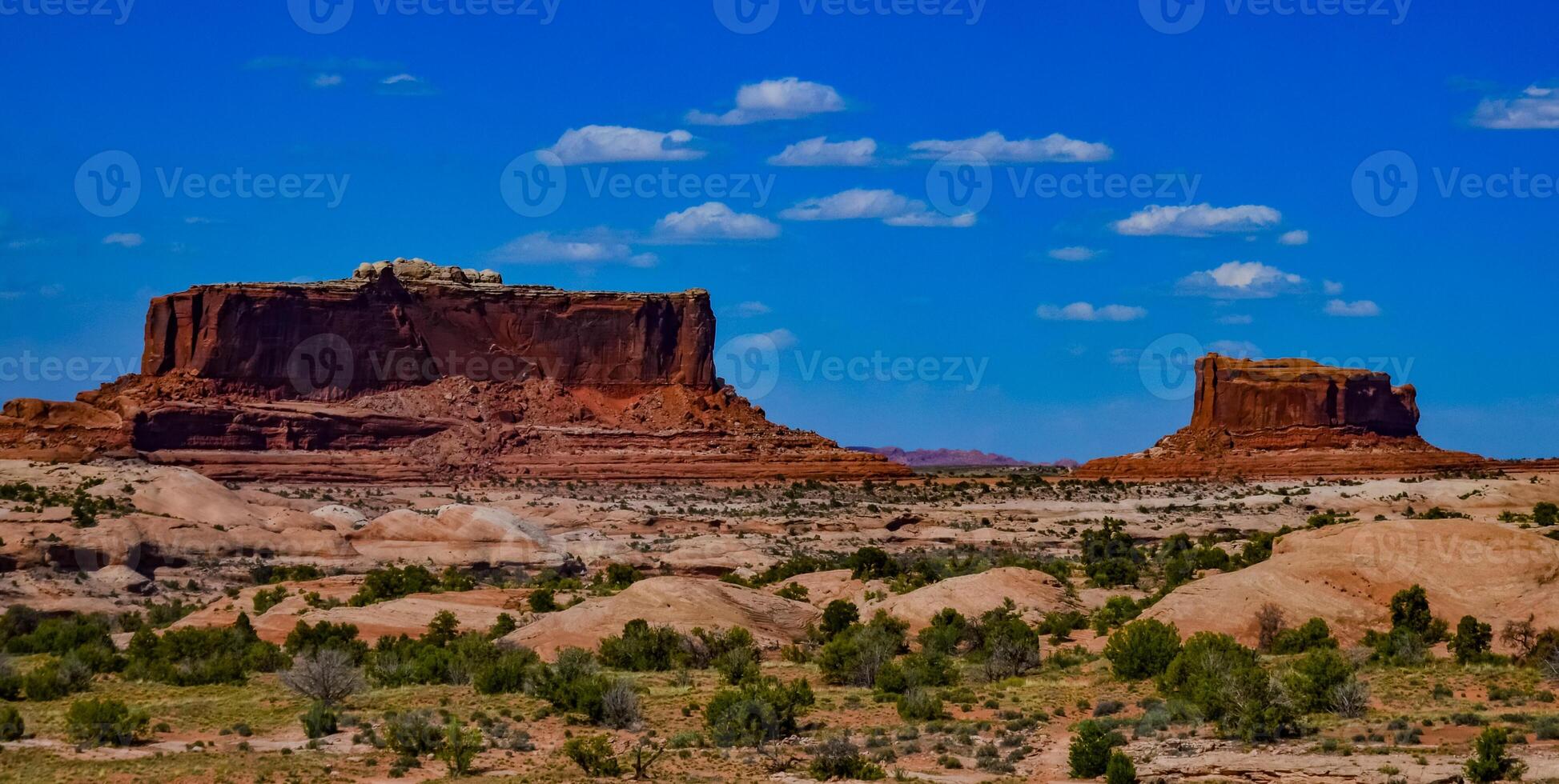 Layered geological formations of red rocks in Canyonlands National Park is in Utah near Moab. photo