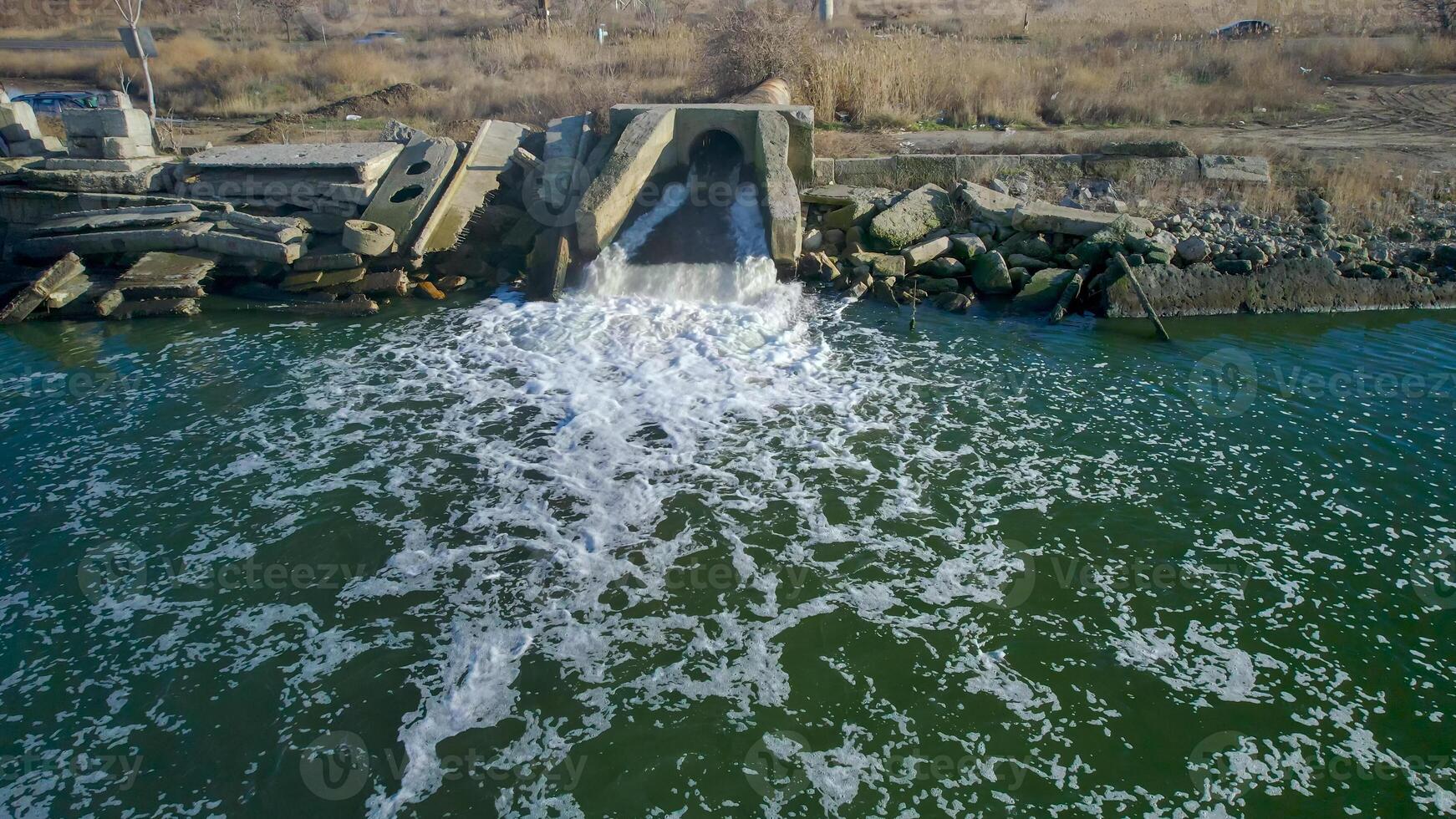 Environmental pollution with dirty sewage photo
