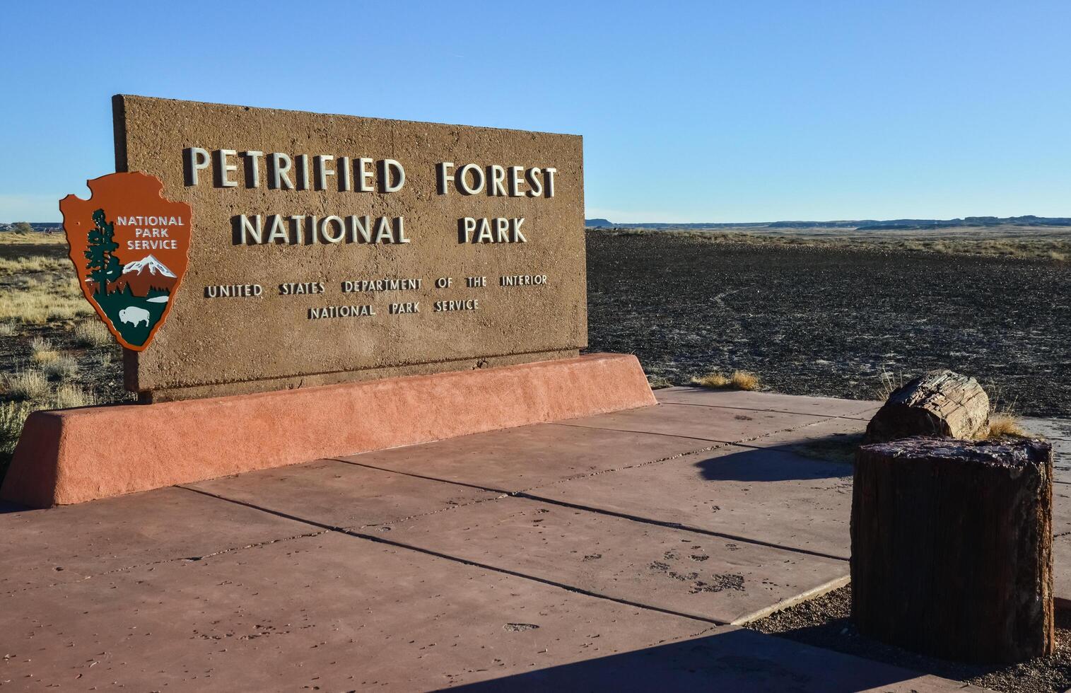 USA, PHENIX, ARIZONA- NOVEMBER 17, 2019 information sign with the name of the park Petrified Forest National Park, Arizona photo