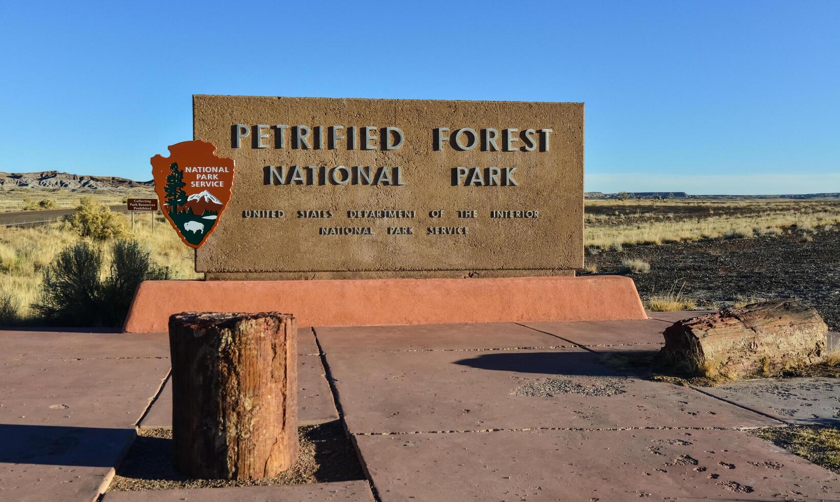 USA, PHENIX, ARIZONA- NOVEMBER 17, 2019 information sign with the name of the park Petrified Forest National Park, Arizona photo