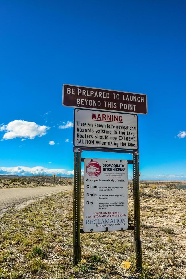 NEW MEXICO, USA - NOVEMBER 21, 2019 Information Plates and Signs Near a Lake in New Mexico photo