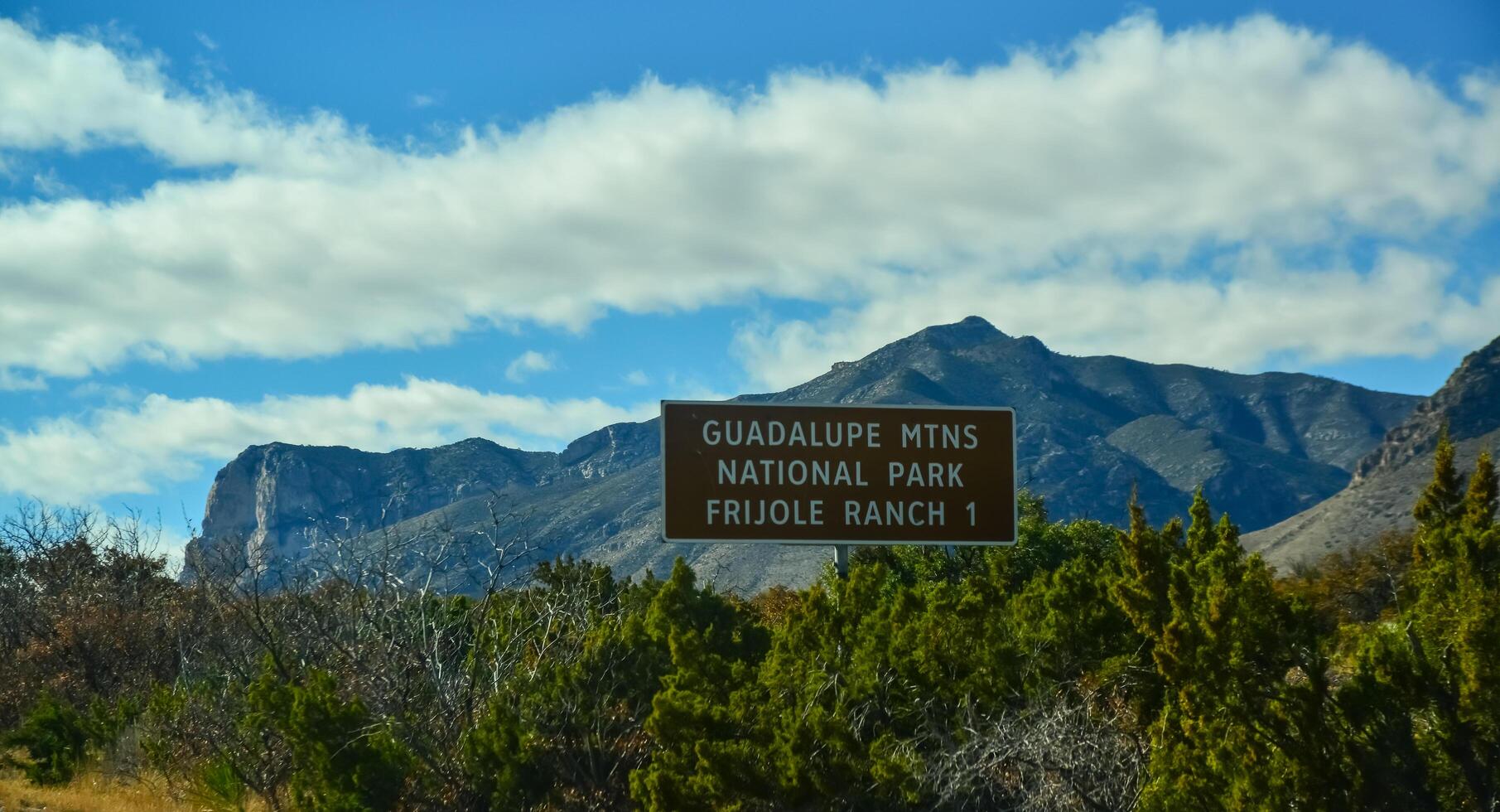 NEW MEXICO, USA - NOVEMBER 22, 2019 Information sign Guadalupe National Park on the background of mountains in New Mexico photo