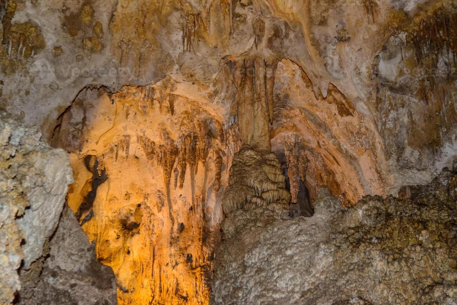 Calcite inlets, stalactites and stalagmites in large underground halls in Carlsbad Caverns National Park, New Mexico. USA photo