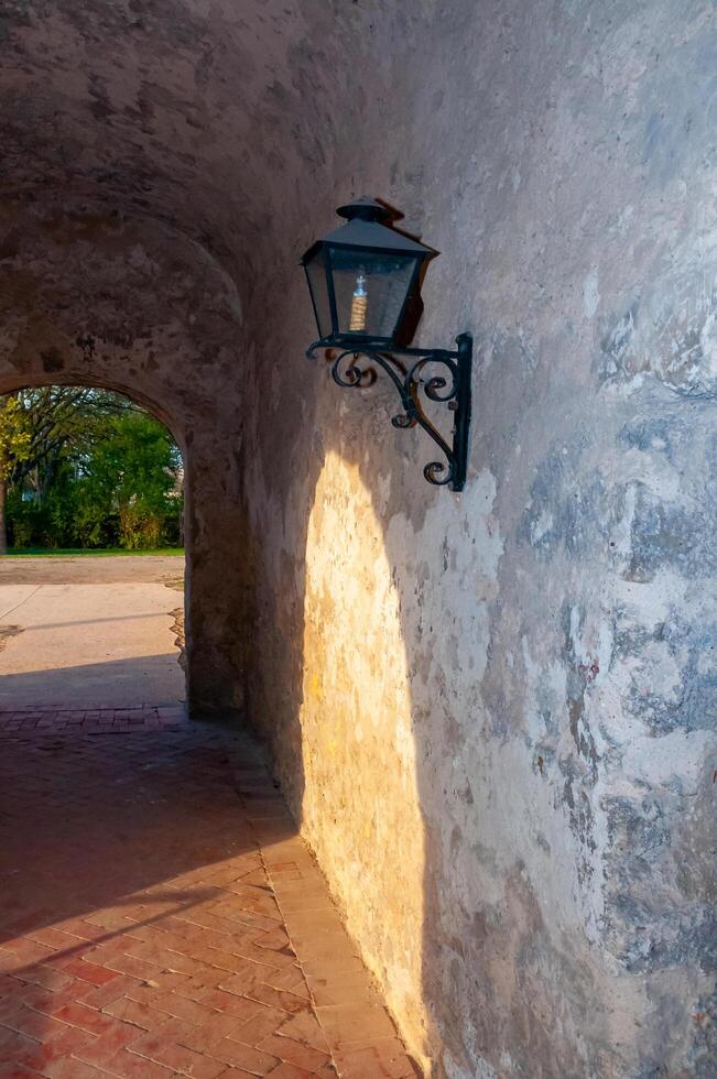 USA, TEXAS - NOVEMBER 25, 2011 vintage lamps inside the church at the tourist site in Mission San Jose, San Antonio, Texas photo