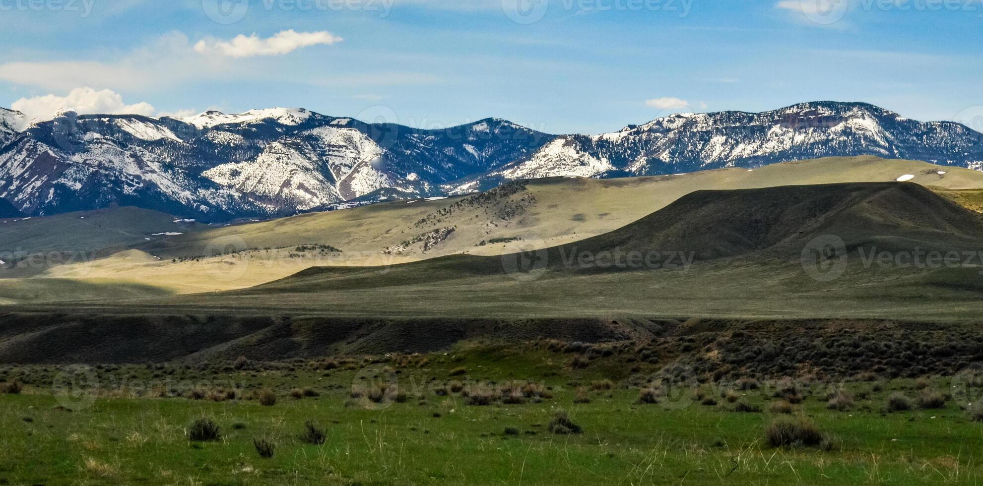 Mountain landscape, snow in the mountains in spring in Montana photo