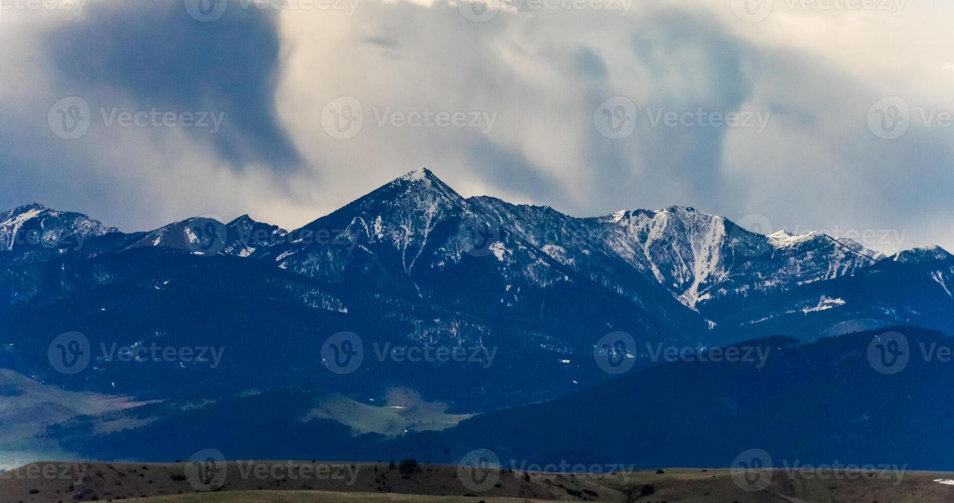 Mountain landscape, snow in the mountains in spring in Montana photo