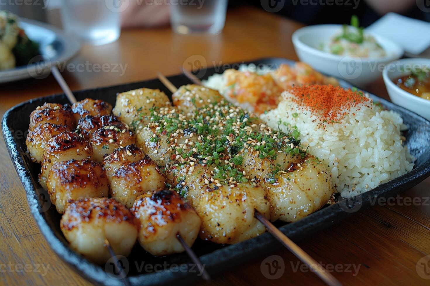 Grilled Mochi Skewers with Sesame Seeds, Green Onions, and Rice photo