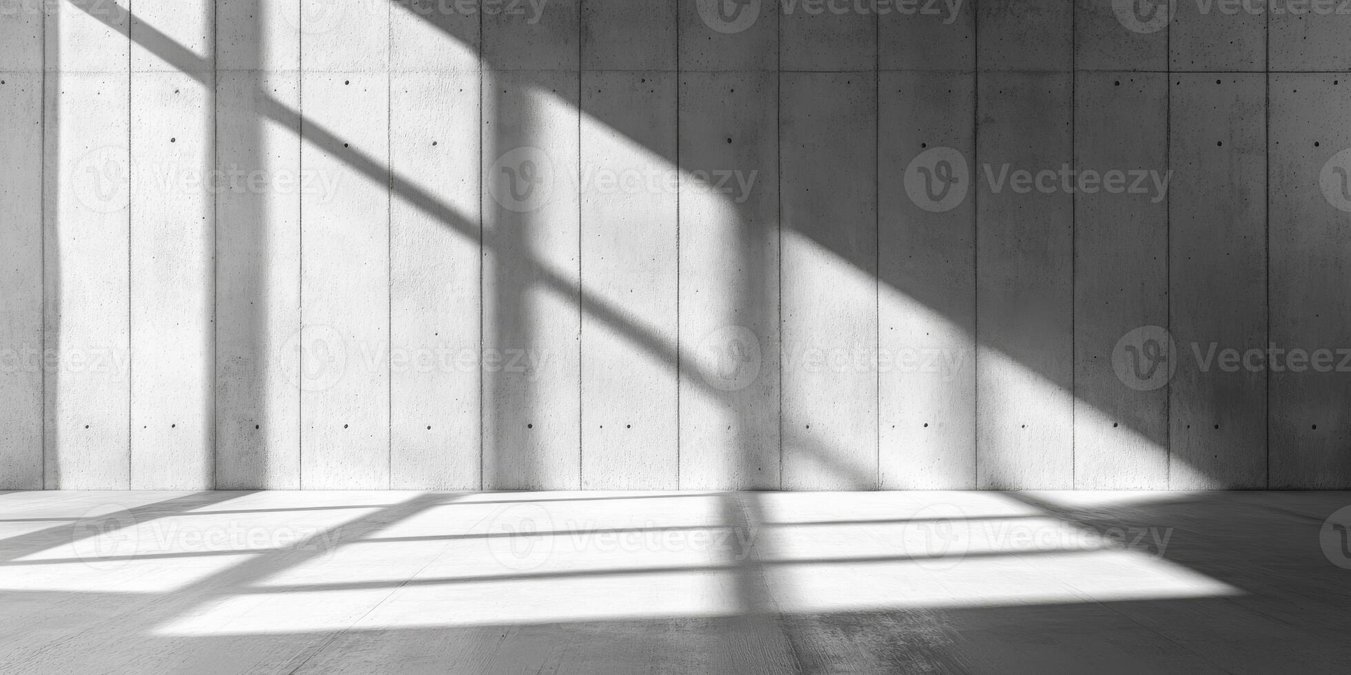 A minimalist concrete space cleverly showcases dynamic light and shadow patterns, making it an ideal setting for impressive product displays, professional presentations, and creative exhibitions photo