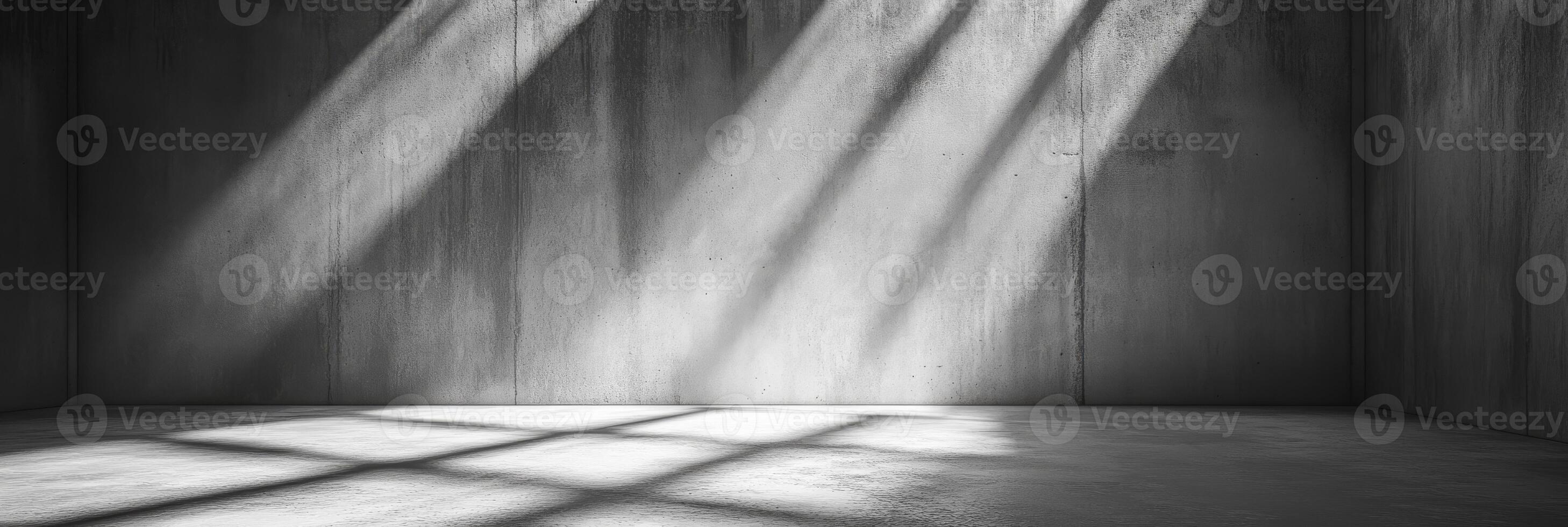 This minimalistic concrete background enhances light and shadow interplay, making it perfect for showcasing products and presentations, while offering versatile space for creative applications photo