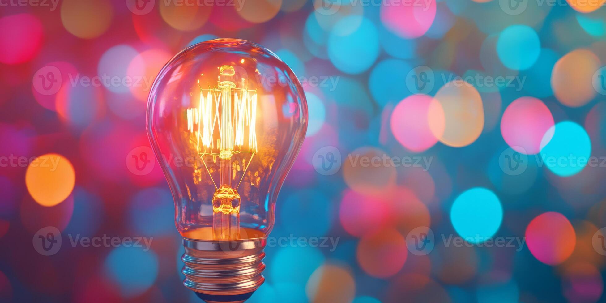 A stunning closeup of a glowing Edison light bulb against a vibrant bokeh background of colorful lights, enhancing its vintage aesthetic and creating a charming, inviting atmosphere photo