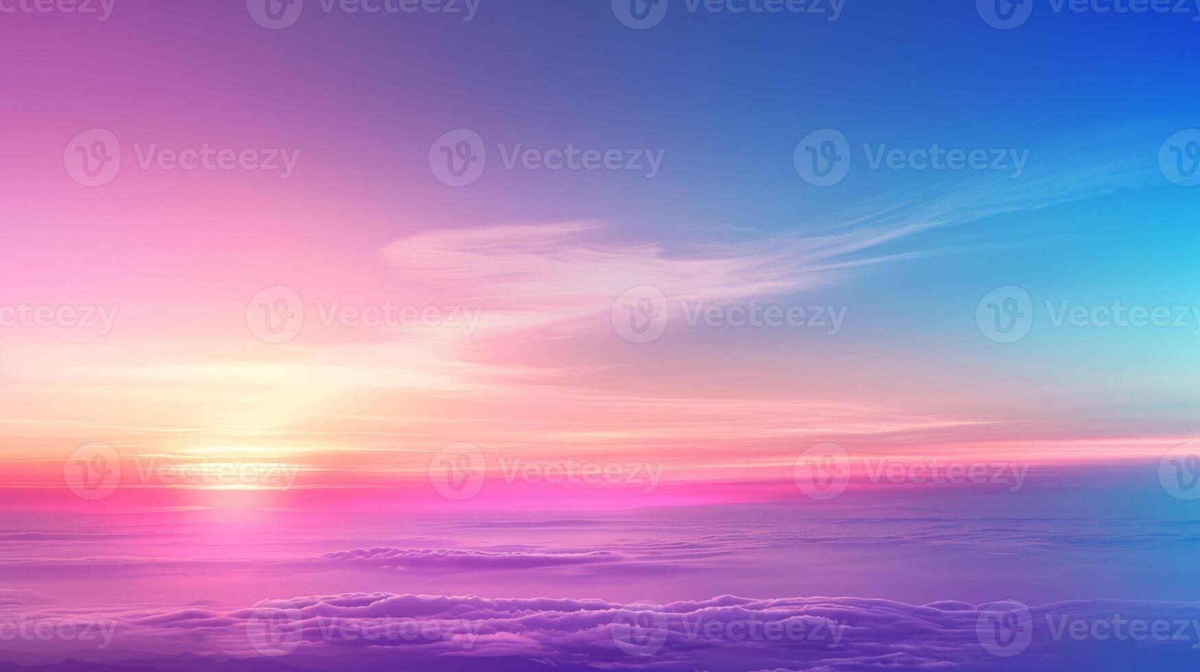 The sunset is mesmerizing, with vibrant pink, purple, and blue colors, casting an ethereal glow over the clouds photo
