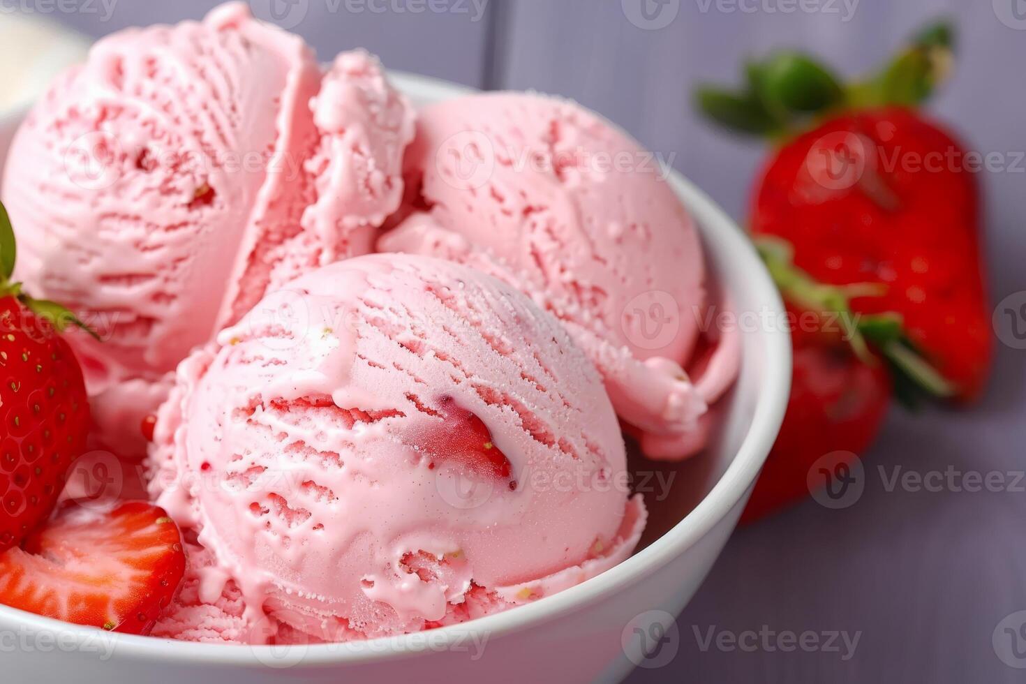 Indulge in the luscious experience of enjoying a creamy vegan strawberry ice cream, a delightful dairyfree dessert made with fresh strawberries, perfect for a refreshing summer treat photo