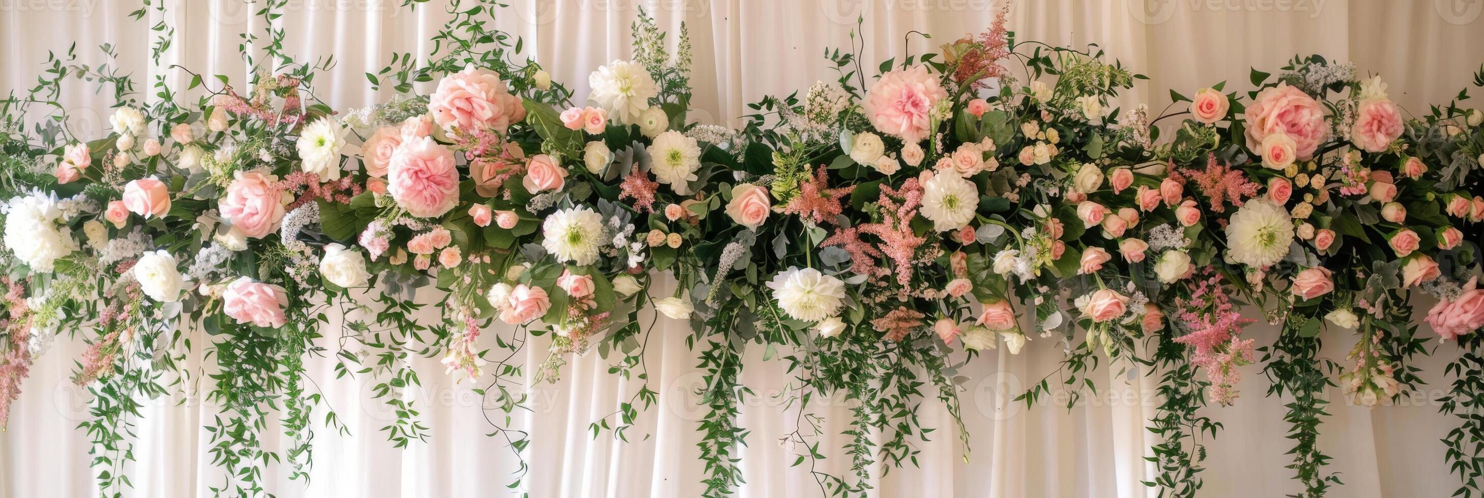 The stunning floral decor featuring soft pinks and vibrant greens is perfect for weddings and special celebrations photo